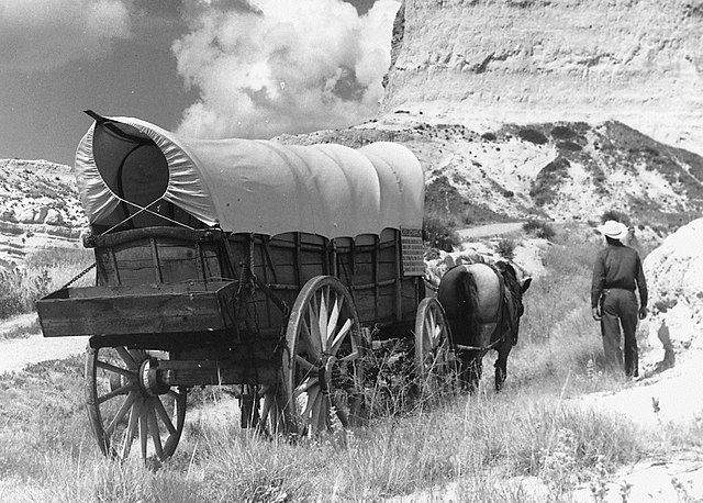 640px-Conestoga_wagon_on_Oregon_Trail_-_NARA_-_286056_crop